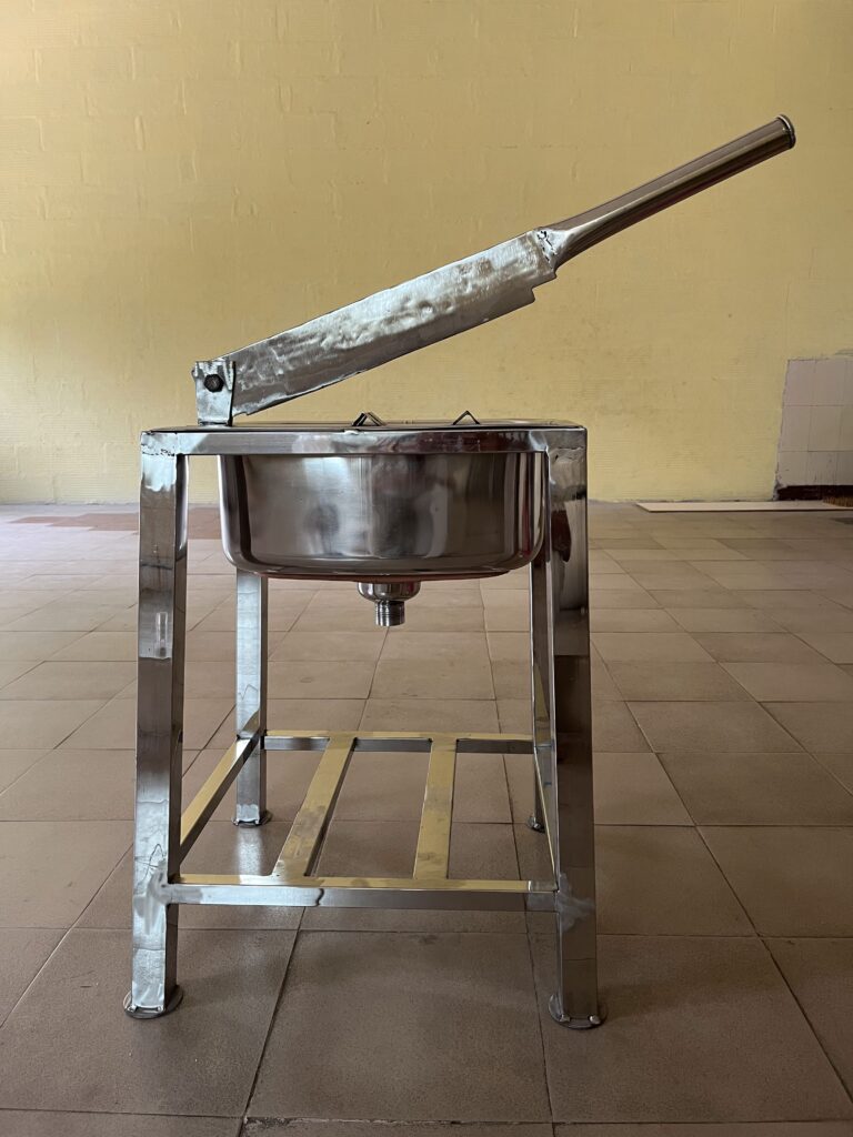 Stainless steel tender coconut cutting machine with water collector sink for commercial use, uma steel works,